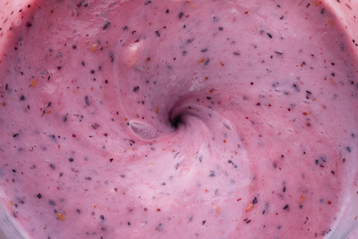 Top View Blending a Berry Smoothie
